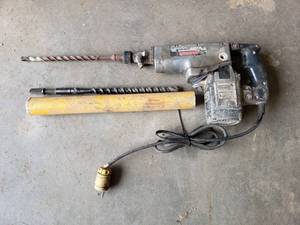 lot 1060 image: Black and Decker Industrial Hammer Drill and Ramset Carbide Bit