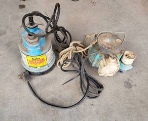 lot 1094 image: Simer Geyser Pump (works) and Big John Pump (for parts)