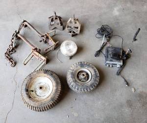 lot 1112 image: Pneumatic Tires, Metal Clamp Tie Downs and CB