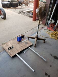 lot 1113 image: Fan and Peg Board Stand
