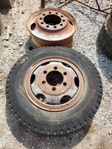 lot 1115 image: General Power Jet 8.2520 Tire with Rim and 22 in. Rim