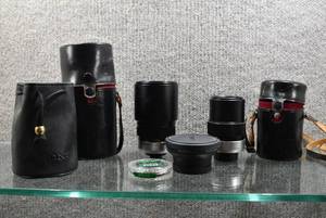 lot 2044 image: Lot of 3 Camera Lenses  Includes 2 Topcon Topcor Lenses - 135mm Lens, A 200mm Lens - & A Sony Wide Conversion VCL-0752H Lens  All Lenses Include Cases -WILL SHIP