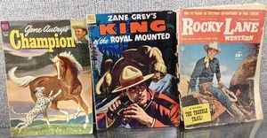 lot 2063 image: Lot of 3 DellFawcett Comics (In Rough ShapeSold As Is) Gene Autrys Champion (1952) #10 King of the Royal Mounted (1952 Dell) #12 Rocky Lane Western (1949) #21 - WILL SHIP -WILL SHIP