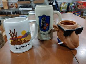 lot 2114 image: Lot of 3 Large Mugs and Coozie  New Mexico Mug, The Black Bull of Clarence, & a Camel Cigarettes Can Coozie -WILL SHIP