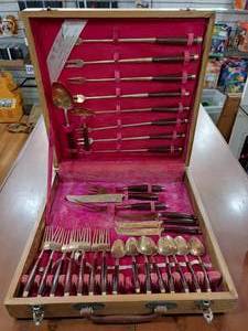 lot 2143 image: Vintage Set Brass Teak Wood Silverware  T James Jewelry  7 Forks, 8 Spoons, 3 Knives, 13 Serving Flatware -WILL SHIP