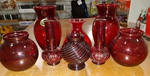 lot 2158 image: Lot of 8 Avon and Anchorglass Ruby Red Glassware  2 Royal Ruby Anchorglass 6 Tall  2 Unmarked Rosebowls 4 Tall  1 Unmarked Bud Vase 4 12 Tall  2 Avon Bud Vases 5 Tall  1 Avon Swirl Vase 3 12 Tall  -WILL SHIP
