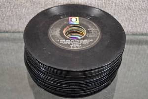 lot 2194 image: Approximately 40 7 45 RPM Vinyl Records  Songs Include The Streak by Ray Stevens, Oh What a Night by The Four Seasons & More -WILL SHIP