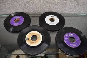 lot 2195 image: Approximately 35 7 45 RPM Vinyl Records  Artists Include Paul McCartney, Spike Jones, Bobby Sherwood & More -WILL SHIP