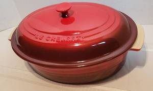 lot 2001 image: Le Creuset Red 5.75 Qt.  14 in.  Lidded CasseroleRoaster