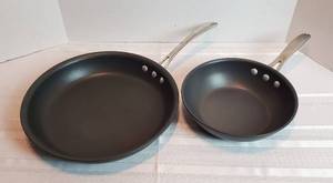 lot 2014 image: 2 Calphalon Skillets  2 Qt. 9 in. Pan (1609)and 12 in. Pan (1392)