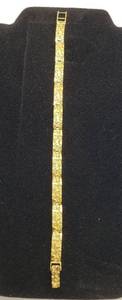 lot 1003 image: 14K Gold Nugget Bracelet  8 in. long  14 in. wide  18g TW