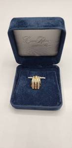 lot 1011 image: Description 14K Gold & over 12 Karat of Brilliant cut, Baguette & Emerald Cut Diamonds designed by Laura Ramsey  2000 and Beyond collection. Local Jeweler gave Retail estimate of $1,800 to $2,000  Necklace Pendant  6g TW