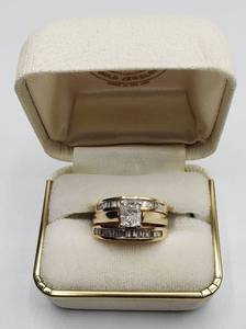 lot 1015 image: 14K Gold & approximately 1 Karat TW of Diamonds with 12 Karat Center Brilliant Cut Diamond, Wedding Set. Local Jeweler gave Retail Estimate of $2,000  Size 5 and 6g TW