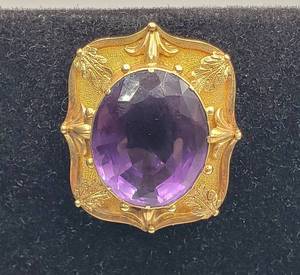 lot 1017 image: Vintage GoldtoneBrass Brooch wLarge Amethyst color Stone