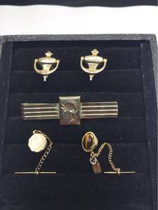 lot 1036 image: Swank Tie pin, Emmons Tiger Eye Tie pin, Hickok Door Knocker Cuff links, Trojan Tie Clip