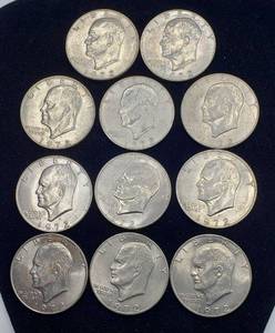 lot 1046 image: 11 Ike Dollars  1972D