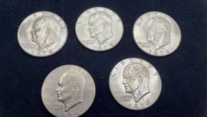 lot 1047 image: 5 Ike Dollars  1974D