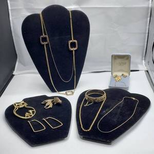 lot 1050 image: Fashion JewelryDKNY  Goldtone  Necklaces, Pins, Bracelet and Earrings
