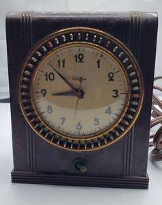 lot 1200 image: Vintage Telechron Household ClockTimer with Bakelite Case  works