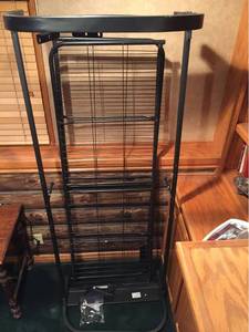 lot 1219 image: Black Metal Full Size Futon CouchBed Frame - Has all parts, broken down to move