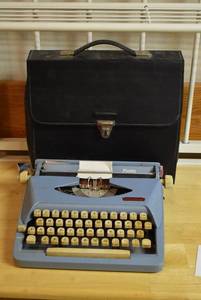 lot 2051 image: Vintage Blue Royal Fiesta Typewriter w. Carrying Case - Made in Holland