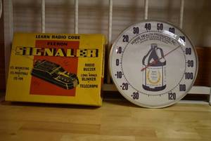 lot 2074 image: Vintage Radio Code Signaler Toy & Horse Health Products Thermometer w. Glass Front