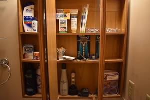 lot 2108 image: Contents of Bathroom  Medicine Cabinet -Includes Gillette Mach 3 Razor NIP