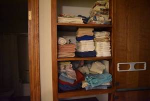 lot 2111 image: Three Shelves of Towels & Fabric Items
