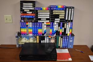 lot 2145 image: Large VHS Tape Lot w. Mitsubishi VCR Deck