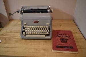 lot 2165 image: Vintage Royal Typewriter w. Old Typing Manual Text