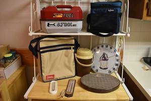 lot 2228 image: Camping Gear Lot -Metal Gas Can Tool Box Kit, COleman Insulated Bag, Thermometers, & Jug