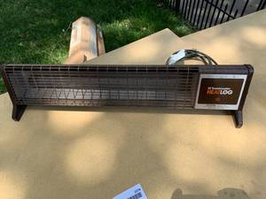 lot 2274 image: Toastmaster Heatlog -Electric Space Heater