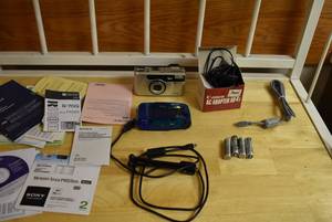 lot 2323 image: Lot of Cameras & Accessories -Canon AC Adapter