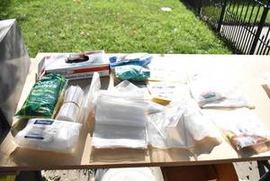 lot 2353 image: Metal File Drawer Cabinet - Full of Safety Gloves, Ziploc Bags, earplugs, rescue breather