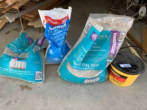 lot 2405 image: Two Bags of Sand, One Bag of Ice Melt, & Bucket of Quikrete