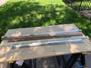 lot 2406 image: Lot of Yardsticks, Piano Hinge, & Door Threshold