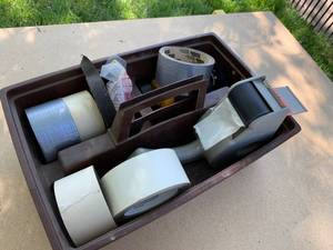 lot 2411 image: Plastic Tote Full of Assorted Rolls of Tape