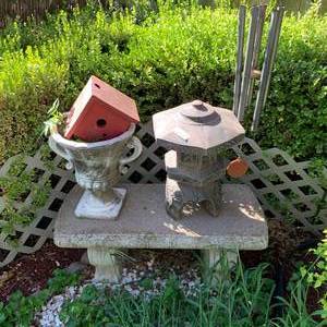 lot 2416 image: Concrete Bench, Birdhouse, Planter & Windchimes, & Concrete Yard Sculpture