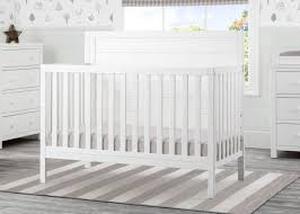 lot 2096 image: Delta Children 4 in 1 crib