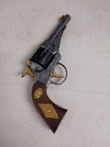 lot 6055 image: metal toy pistol Cap gun