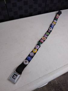 lot 6169 image: seat belt bottle tops belt