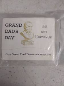 lot 6332 image: 1966 grand dads day tee pegs