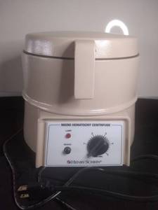 lot 3035 image: Beige Micro Hematocrit Centrifuge By Henry Schein