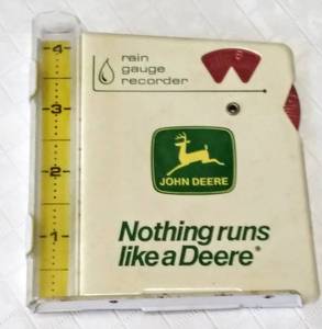 lot 125 image: Vintage John Deere Rain Gauge