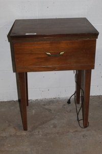 lot 9347 image: Sewing Machine in cabinet