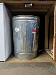 lot 7409 image: 31 Gallon Galvanized Steel Garbage Can