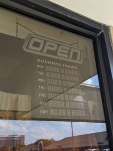 lot 7434 image: Greenlight Innovations Spectrum LED Open Sign With Business Hours