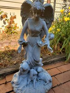 lot 32 image: Molding of Angel Over Kid and Sheep