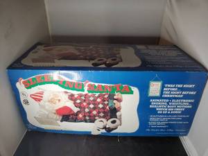 lot 8045 image: Sleeping Santa Animated Decor