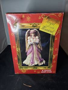 lot 8047 image: Angel with Candle Music Figurine